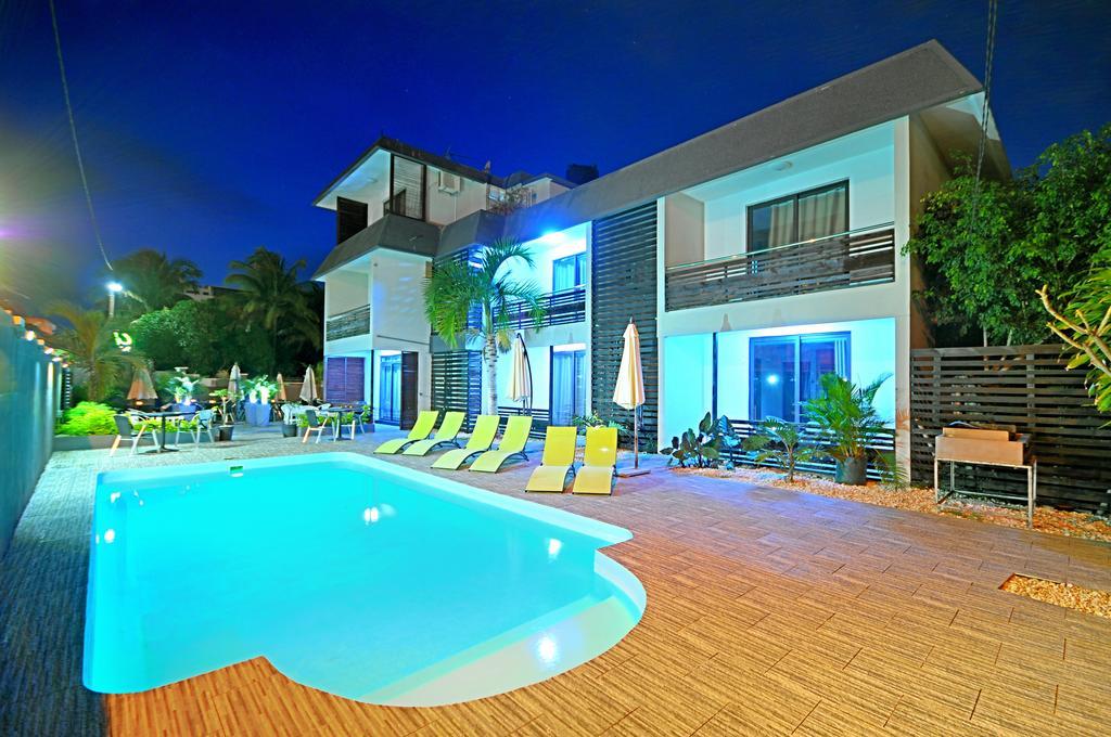 West Palm Inn Flic en Flac Экстерьер фото