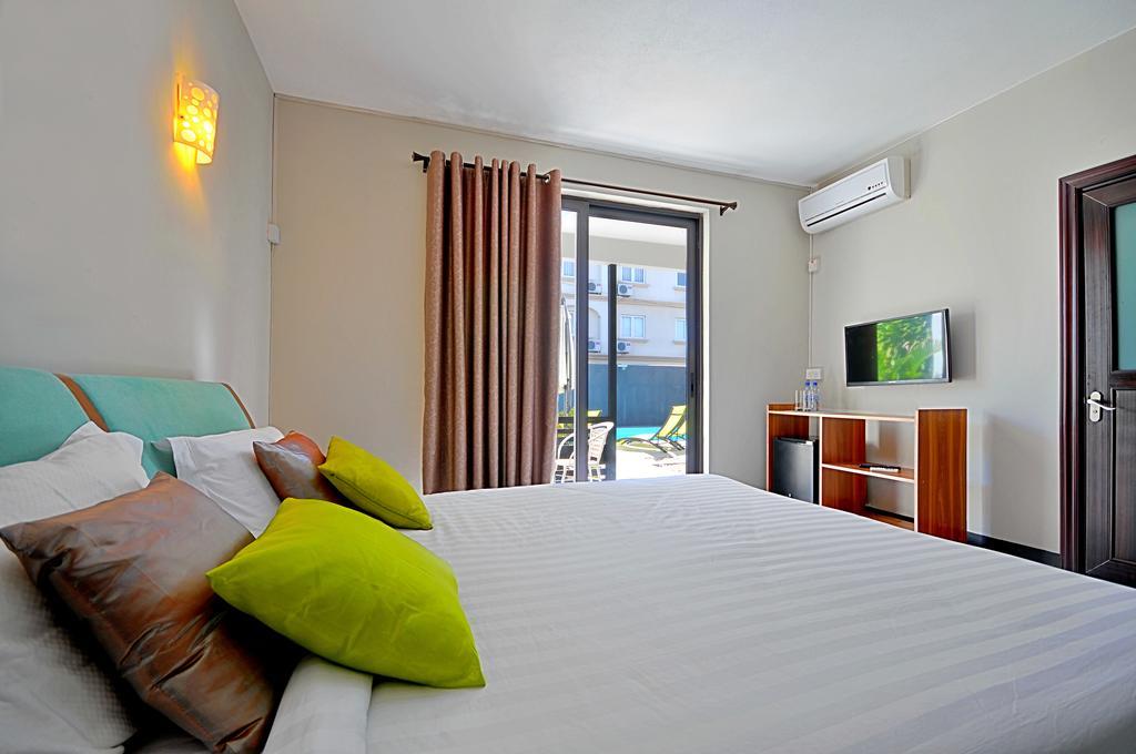 West Palm Inn Flic en Flac Номер фото