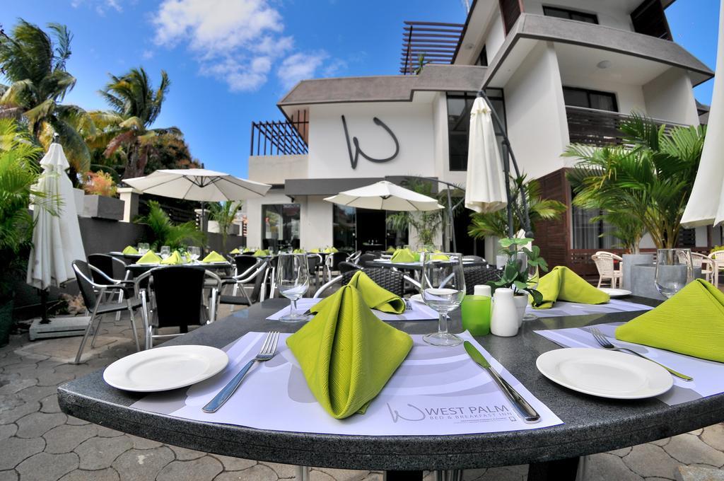 West Palm Inn Flic en Flac Экстерьер фото